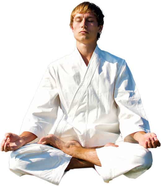 Martial Arts Lessons for Adults in Mobile AL - Young Man Thinking and Meditating in White